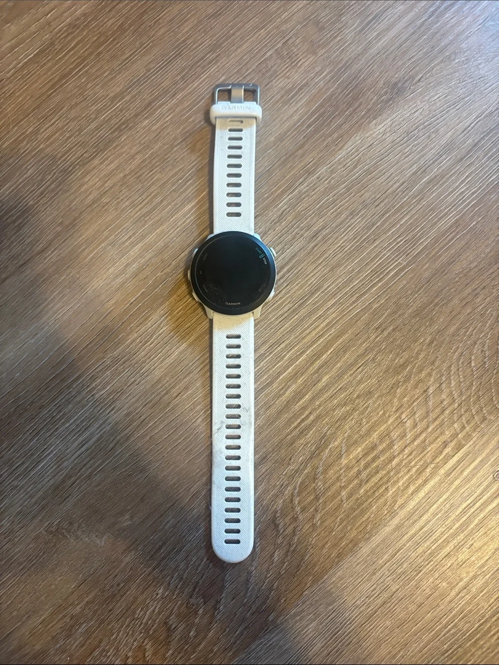 garmin white fitness GPS smartwatch with silicone strap